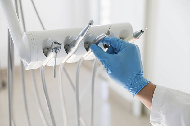 Professional Emergency Dentist technician working in Christopher, IL